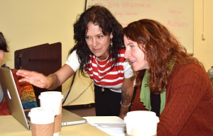 Photo: Margaret McKinney/Highlands University Media arts graduate and AmeriCorps intern Tara Trudell, left, shows her film to Lesley Kadish of the Smithsonian Institution Accessibility Program. The film is featured in a multisensory interactive exhibit media arts students are creating. 