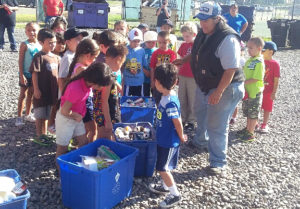 Kindergarten children at recycling center