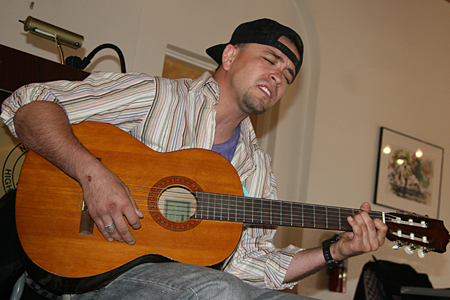 Benito Martinez performs music