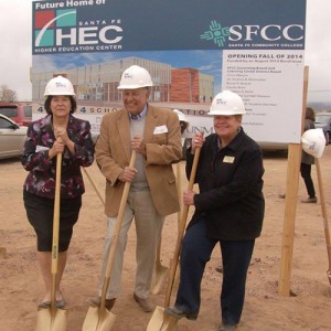 photo of three people with shovels