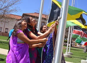 International students raising flag