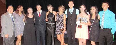 High School students from Northern New Mexico pose at the awards dinner for the National Hispanic Institute leadership training in Colorado. From the left are Fidel Trujillo, Highlands dean of students; Anicia Roybal, Española; Ambrozia Medina, Mora; Luke García, Santa Fe; Victoria Valdez, Las Vegas; Alanie Rael, Pecos; Santiago Laumbach, Mora; Monique Olívas, Santa Fe; Kelsey García, Las Vegas; and Miguel Martínez Las Vegas. 