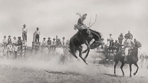 cowboy on bucking horse