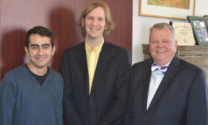 Margaret McKinney/Highlands University Highlands organic chemistry senior Melecio Perea, left, met with organic chemistry professor Brooks Maki and Highlands President Sam Minner April 5 to talk about Perea’s National Science Foundation fellowship and research interests. 