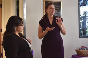 Photo of April Kent talking to audience
