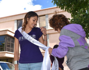 student recieving sash 