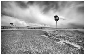 landscape photograph with stop sign.