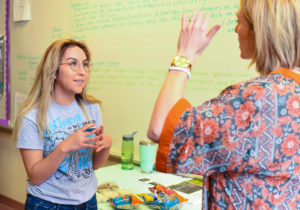 Photo of recruiter and student speaking