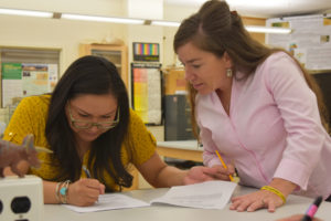 Photo of student and professor in geology lab