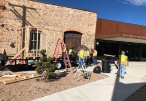 Photo of large sculpture being installed in front of the Trolley Building