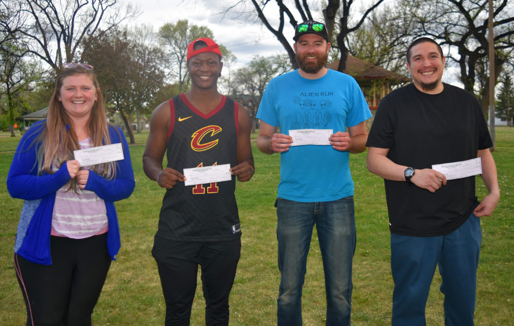 Photo of Kate Diem, Donavan Kandjii, James Boyle and Eric Martinez, all environmental geology students, who all won New Mexico Geological Society scholarships.