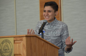 Photo of Gabi Hernandez speaking at podium.