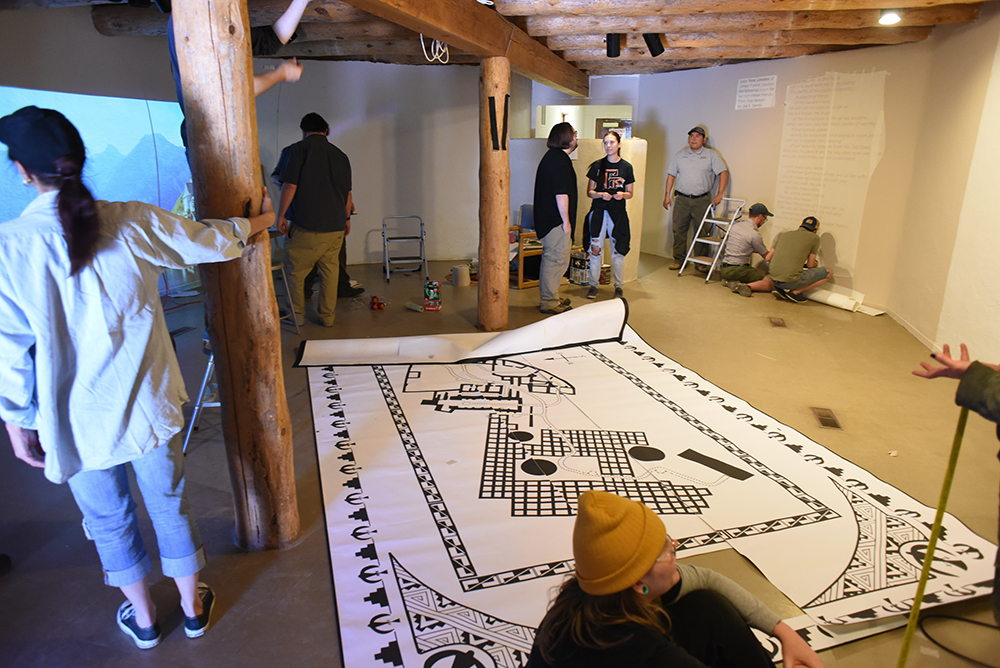 Photo of people working inside the visitors' center.