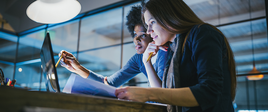 photo of students at a computer