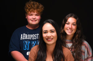 Photo of Adrian Lopez, Desiree Martínez, and Kayla DeVries.