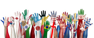 Photo: Group of Diverse Flag Painted Hands Raised