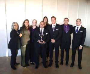 Photo of business ethics competition winners and their professors.