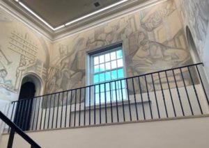 Photo of Rodgers Hall stairwell with mural.