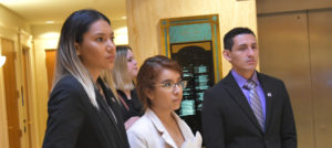 Photo of three students at Legislature.