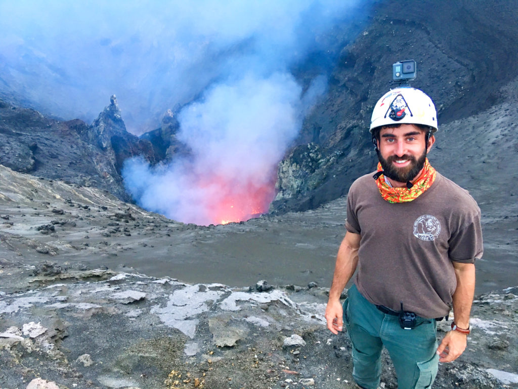 photo of João Lages next to active volcano