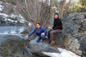 Courtesy Photo: Jennifer Lindline/Highlands University Highlands geology students Megan Begay, left, and Letisha Mailboy conduct water quality field research at the Upper Pecos River.