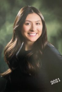 Portrait of Savannah Padilla, NMHU graduate.