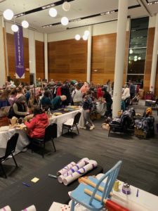 Local merchants sell holiday items to shoppers at the Shop Small Mall event