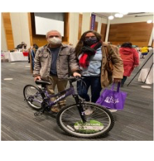 Photo of winners with new bike