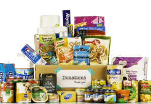 Stock photo of a donations box filled with non-perishable food