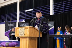 President of NMHU Dr. Sam Minner addresses the graduates of the Class of '22