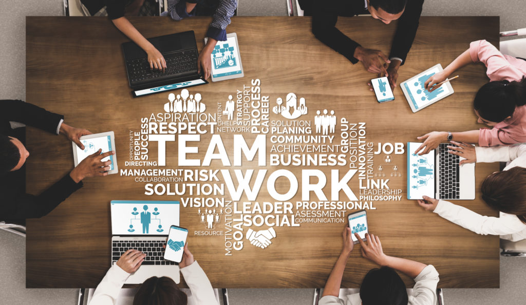 Teamwork and Business Human Resources - Group of business people working together as successful team building strength and unity for organization. Partnership, agreement and teamwork concept.