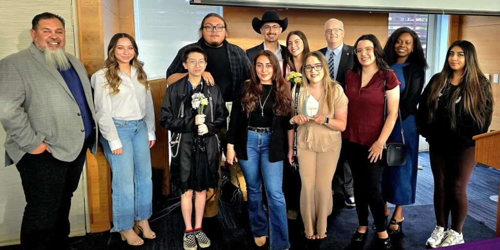 Image of the NMHU Club of the Year, the Student Social Engagement Club. Pictured: Back Row; Jesus Gonzales, Cody Rivera, Adara Bustos, Dr. Neil Woolf, Princess Egoh. Front Row; Dr. Ben Bencomo (Club Advisor), Aliana Crespin, Killua Gabaldon, Daniela Rey Alvarez, Alicia Urioste, Leena Martinez, Kaitlyn Romero.