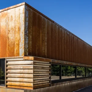 Image of a weathered wooden and steel building