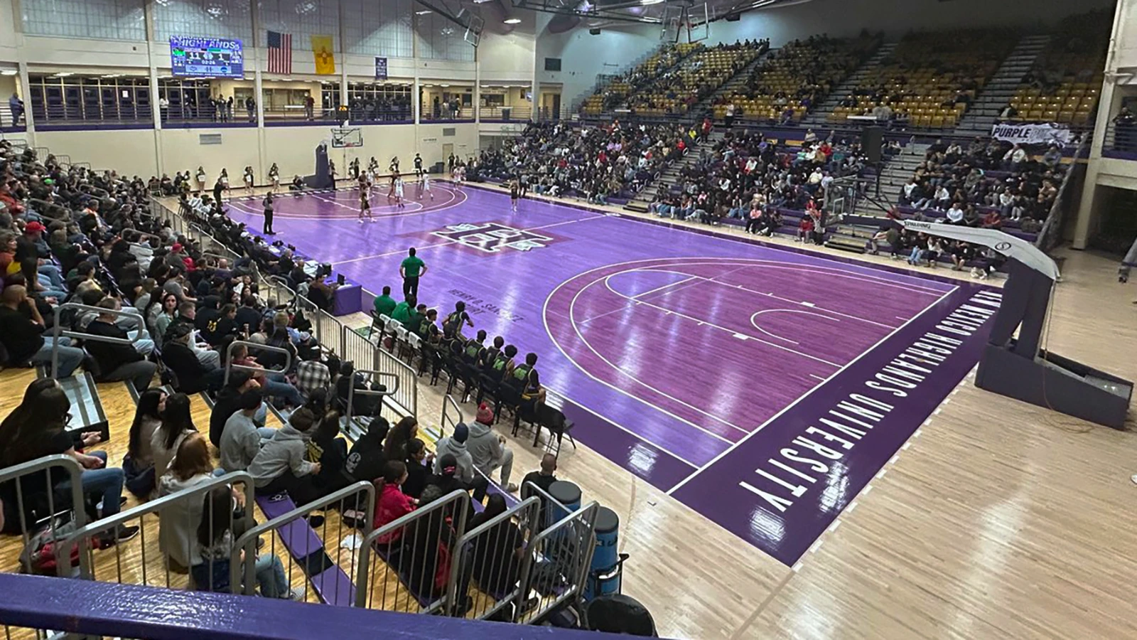 Image of the Wilson Center basketball court during a game.