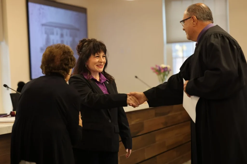 Image of NMHU Student Regents Grace Herrera at the Board of Regents meeting
