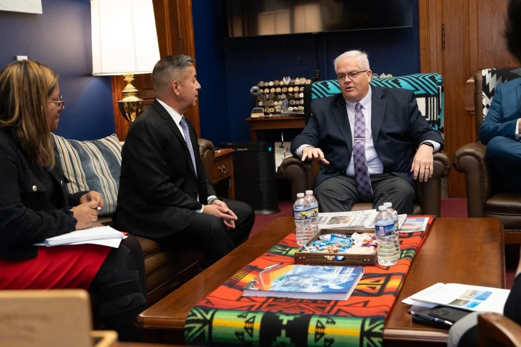 Image of NMHU President Neil Woolf meeting with U.S. Senator Ben Ray Lujan