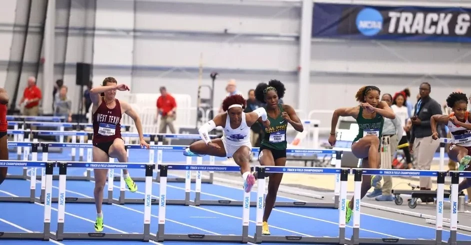 Image of NMHU athlete Patreece Clarke running at a track meet