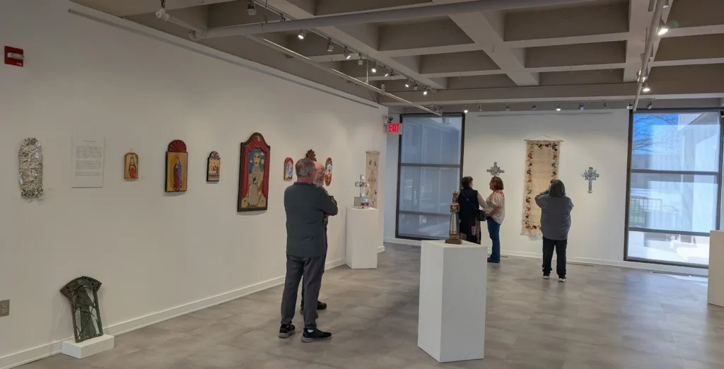 Image of the opening reception for the 2026 Northern New Mexico Devotional Art Show at the Ray Drew Gallery at the Thomas C. Donnelly Library. 