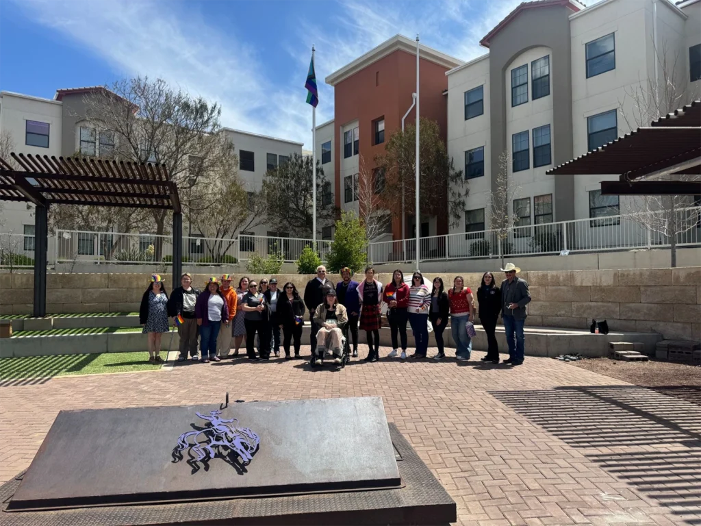 Dr. PJ Sedillo, NMHU President Dr. Neil Woolf and the President’s Council on Diversity, Equity, and Inclusion at the NMHU Cultural Park for the Pride Flag raising event.